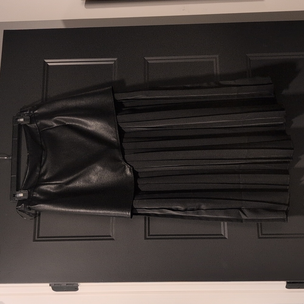 Commense - 1/4 Leather Like Skirt With Flowy Bottom.